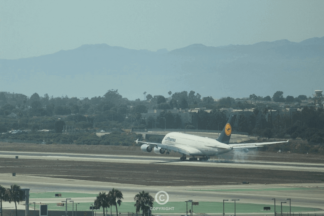 A powerful aircraft descends onto the runway—. A symbol of precision, control, and the final approach to success.