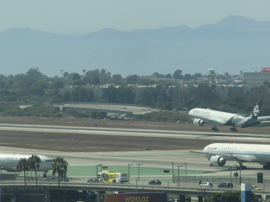 Aircraft landing and taxiing for takeoff—symbolizing SME legacy and scale readiness inspired by family-owned business strategy.
