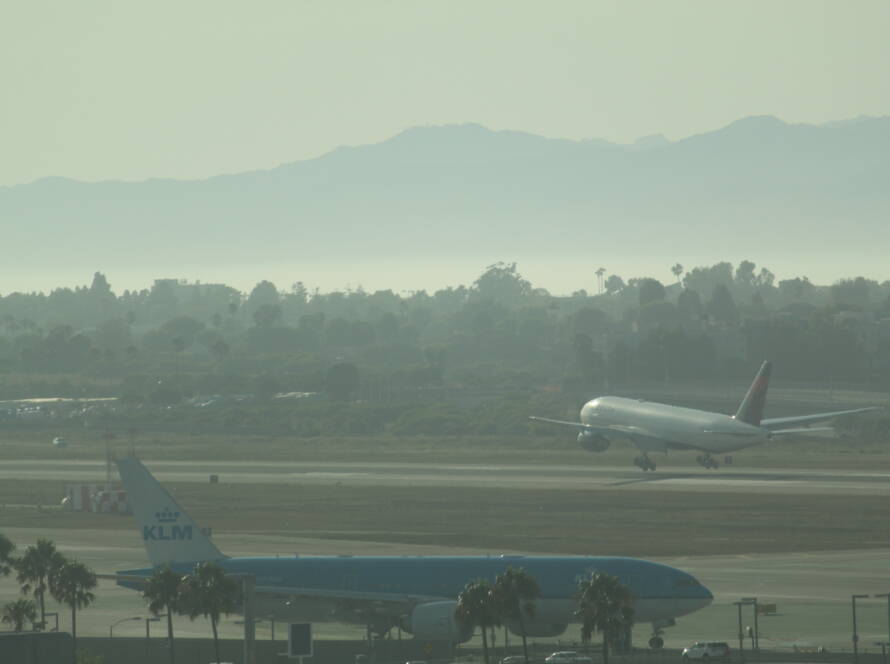 Delta aircraft moments from touchdown, landing gear inches above the runway, symbolising SME leaders executing their strategy with clarity and precision.