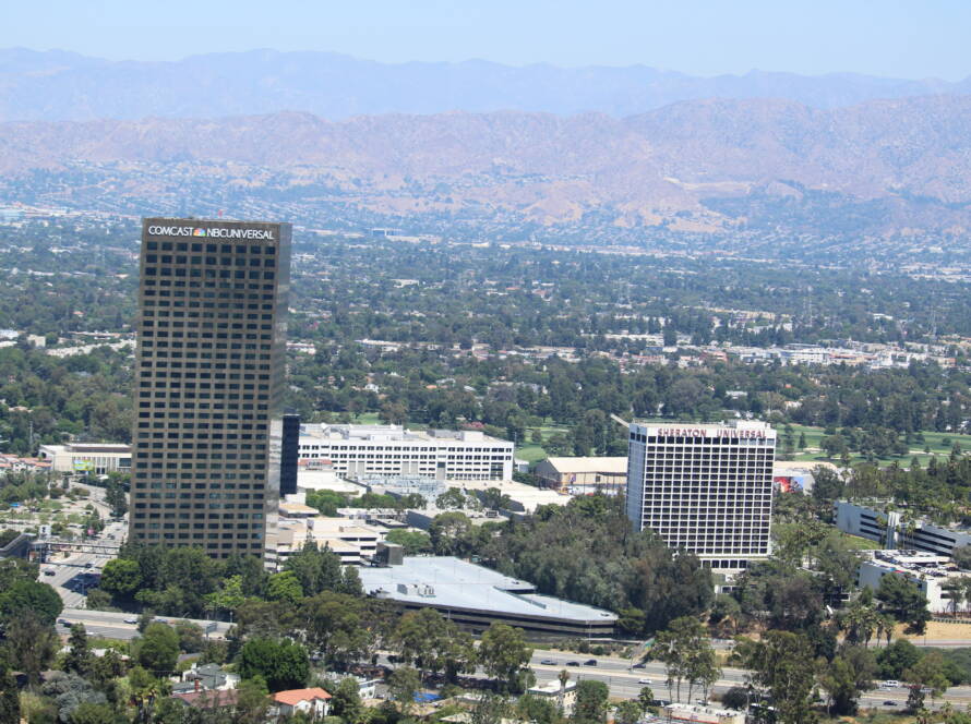 HERO image of Universal City’s high rise corporate district, representing the elevated perspective SME owners need to build sustainable competitive advantage and steward their businesses through the Great Ownership Transfer.